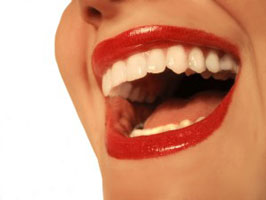 Happy Young Woman with Porcelain Veneers